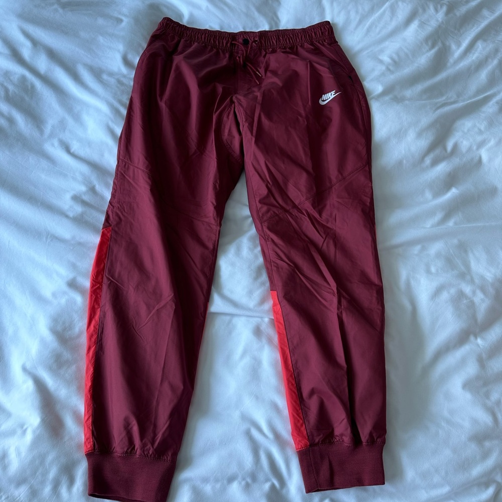 Men’s Nike Windrunner sweats.
